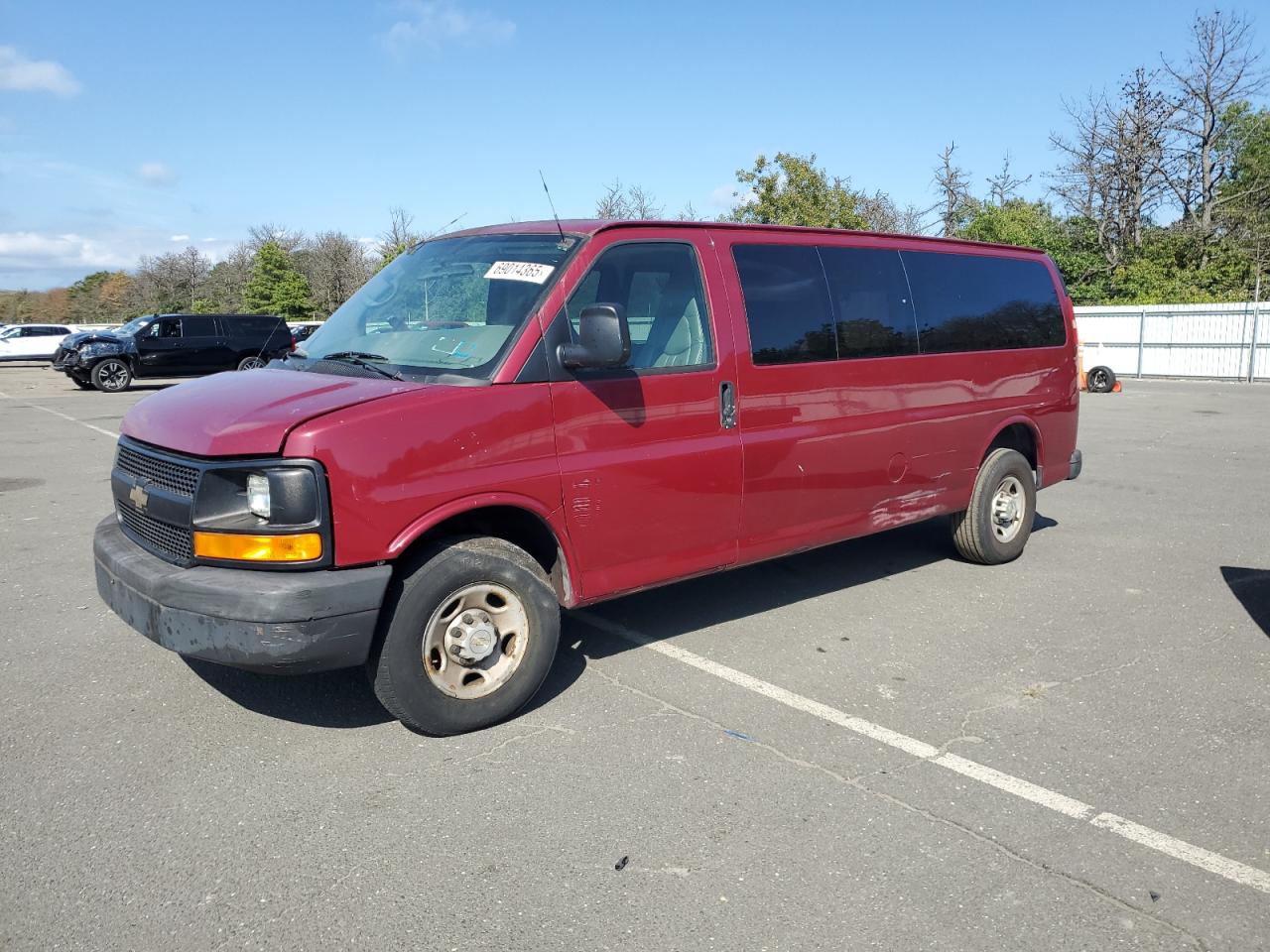 2009 Chevrolet Express Passenger, VIN 1GAHG39K891171907 — Side