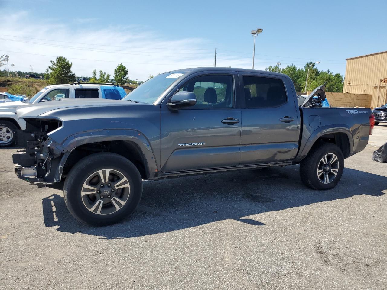 2019 Toyota Tacoma SR5, VIN 3TMAZ5CN4KM103355 — Front end
