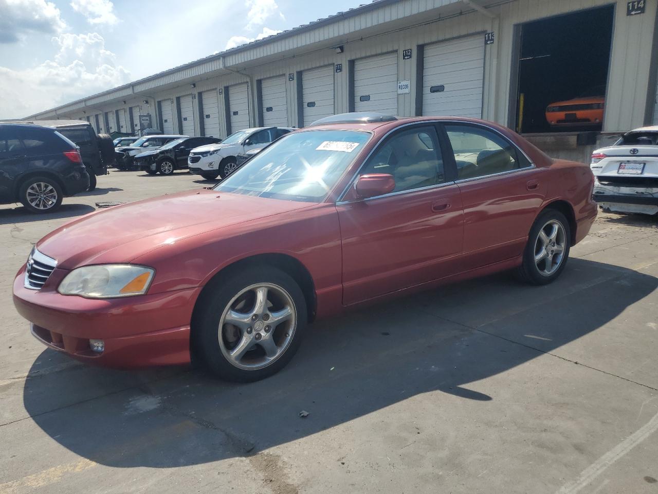 2002 Mazda Millenia S, VIN JM1TA222021728032 — Normal wear