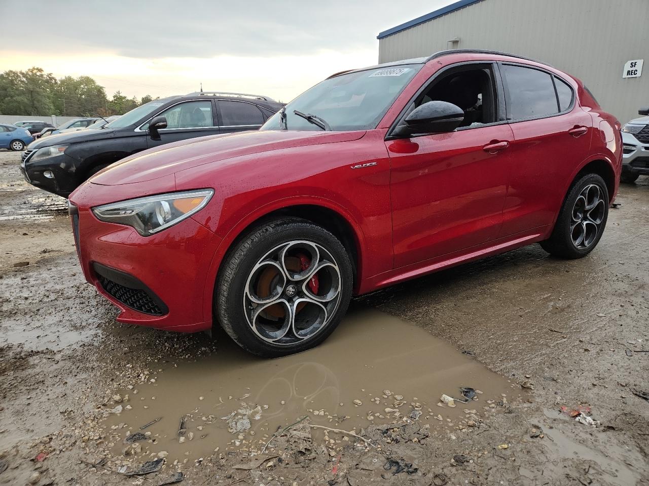 2023 Alfa Romeo Stelvio Ti, VIN ZASPAKBN2P7D67913 — Water / flood