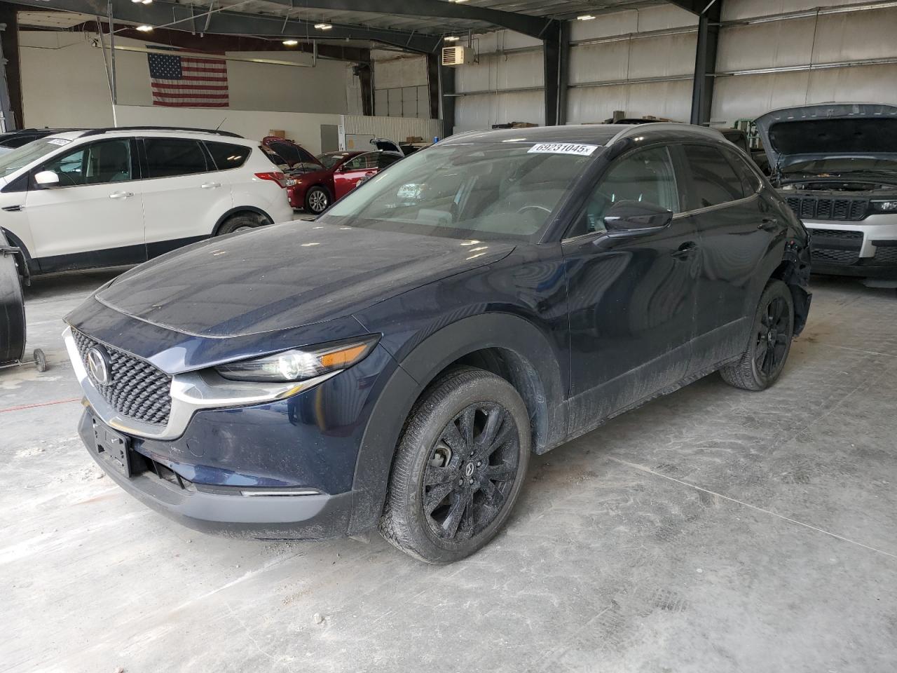 2024 Mazda CX-30 S Select Sport, VIN 3MVDMBBM6RM609460 — Rear end