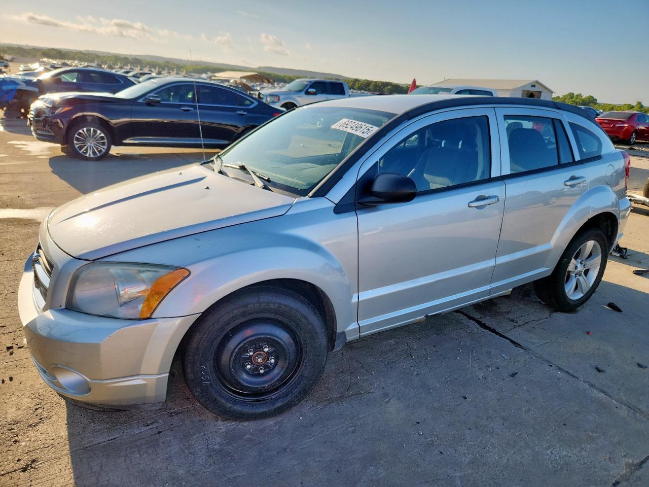 2010 Dodge Caliber Mainstreet, VIN 1B3CB3HAXAD566183 — Front end