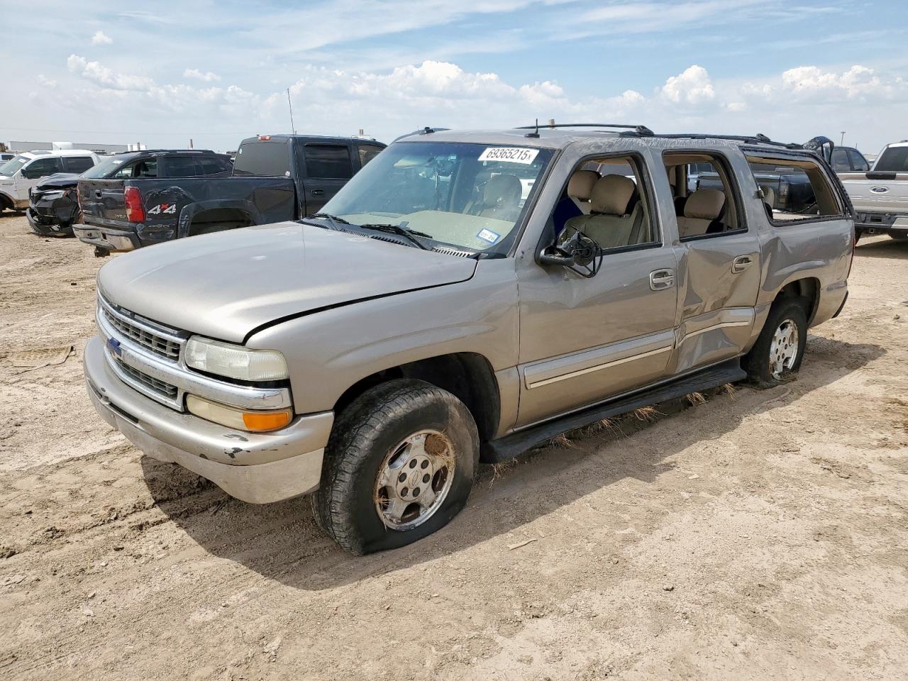 2003 Chevrolet Suburban LT, VIN 1GNEC16Z73J310466 — Rollover