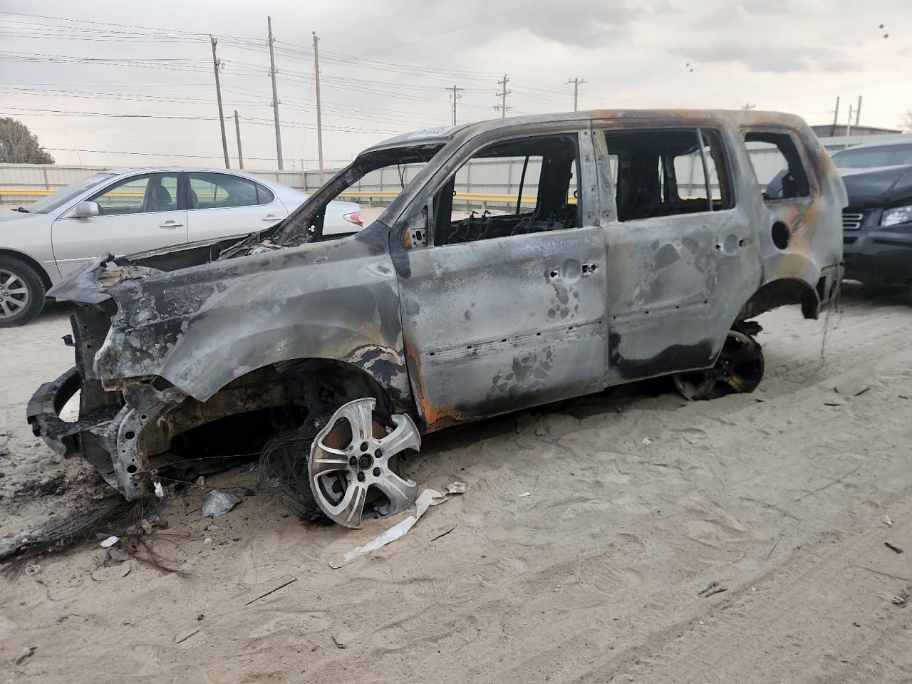 2012 Honda Pilot EX-L, VIN 5FNYF3H58CB038567 — Burn
