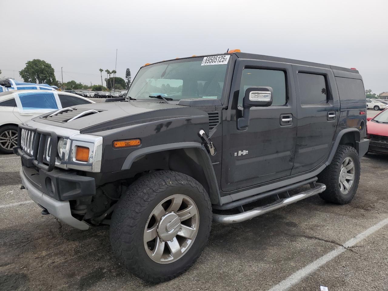 2009 Hummer H2, VIN 5GRGN83239H103132 — Minor dents and scratches