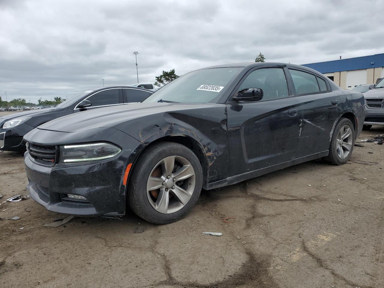 2015 Dodge Charger SXT, VIN 2C3CDXHG5FH824838 — Side