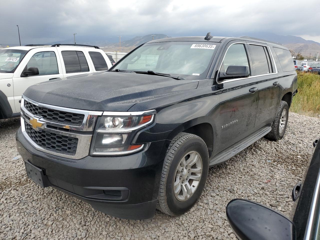 2018 Chevrolet Suburban LT, VIN 1GNSKHKC7JR104000 — Rear end