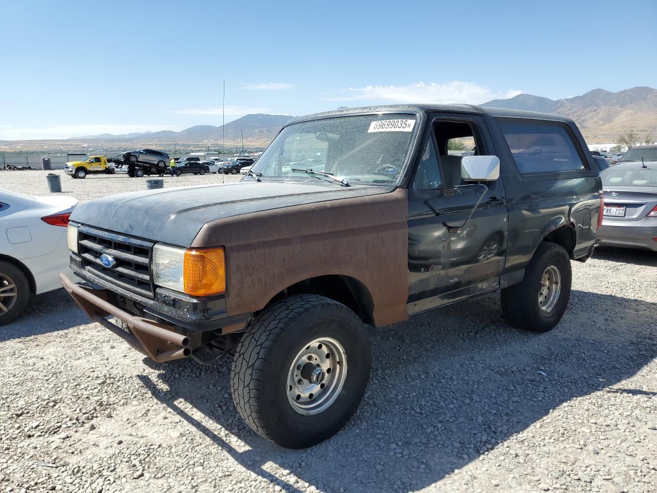 1991 Ford Bronco Custom, VIN 1FMEU15H4MLA53718 — Side