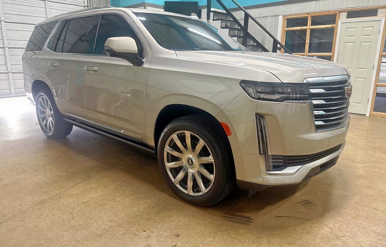 2021 Cadillac Escalade Premium Luxury Platinum, VIN 1GYS4DKL6MR242198 — Prior damage history