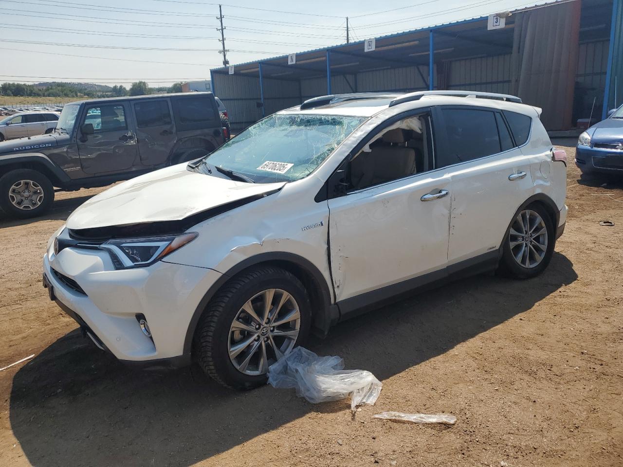 2017 Toyota RAV4 Limited, VIN JTMDJREV3HD102856 — Side