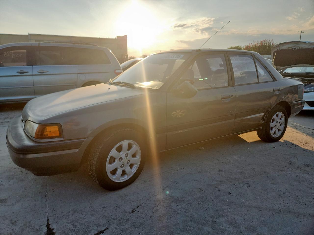 1994 Mazda Protege, VIN JM1BG2265R0782553 — Механическое