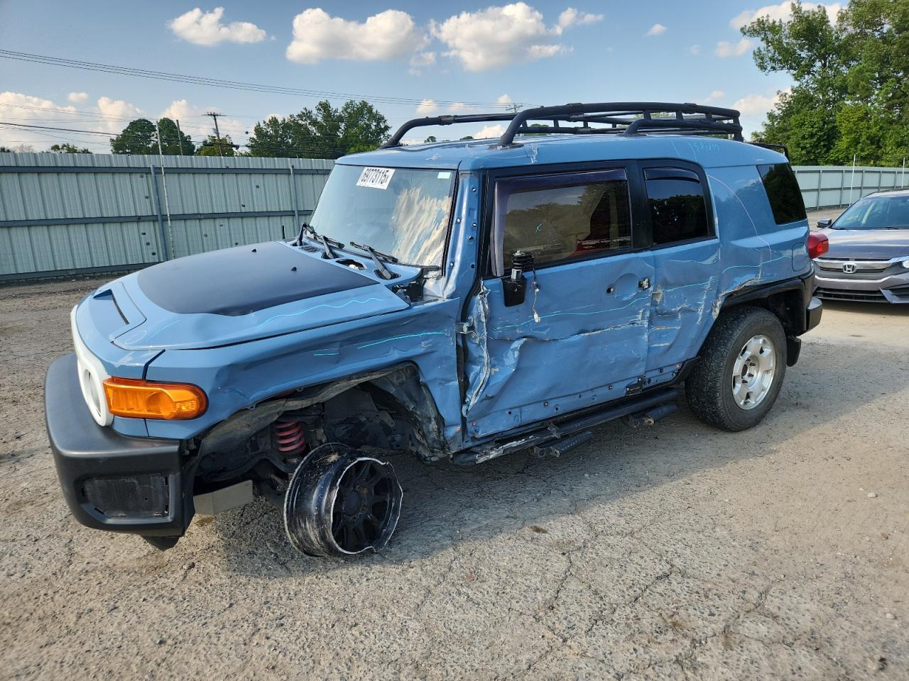 2014 Toyota FJ Cruiser, VIN JTEBU4BF5EK197518 — Side