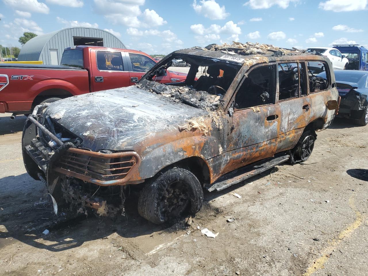 1999 Lexus LX 470, VIN JT6HT00W1X0058408 — Burn