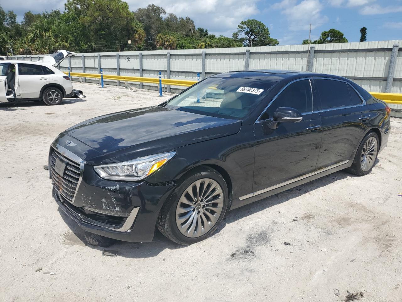 2019 Genesis G90 Premium, VIN KMTF34JA1KU061760 — Side