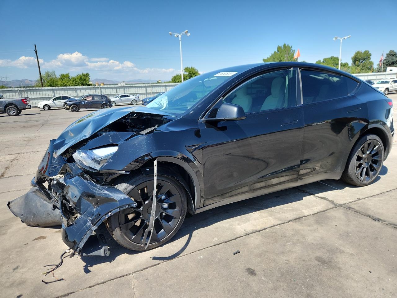 2021 Tesla Model Y Long Range, VIN 5YJYGDEE6MF120287 — Front end