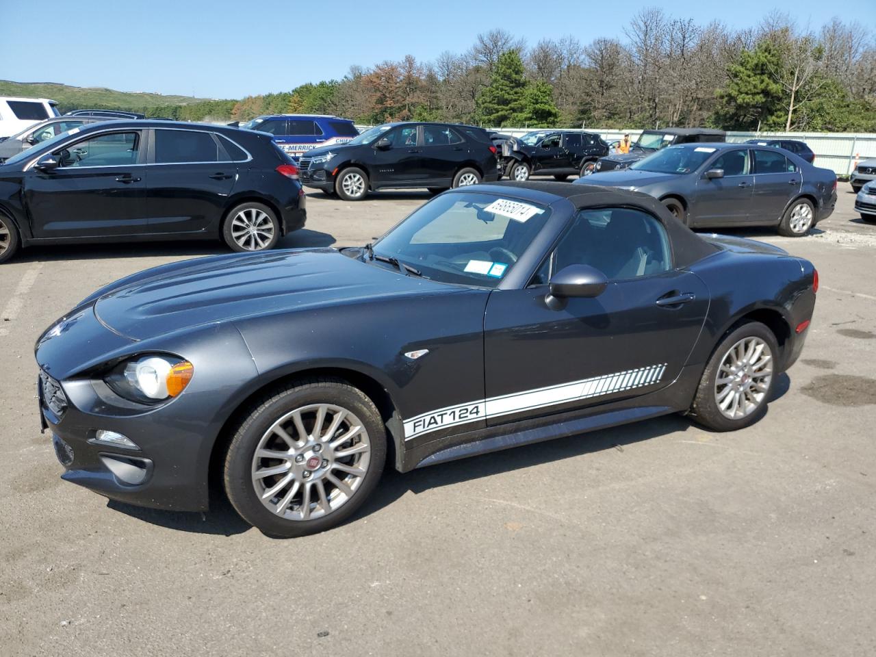 2017 FIAT 124 Spider Lusso, VIN JC1NFAEK0H0128364 — Бок