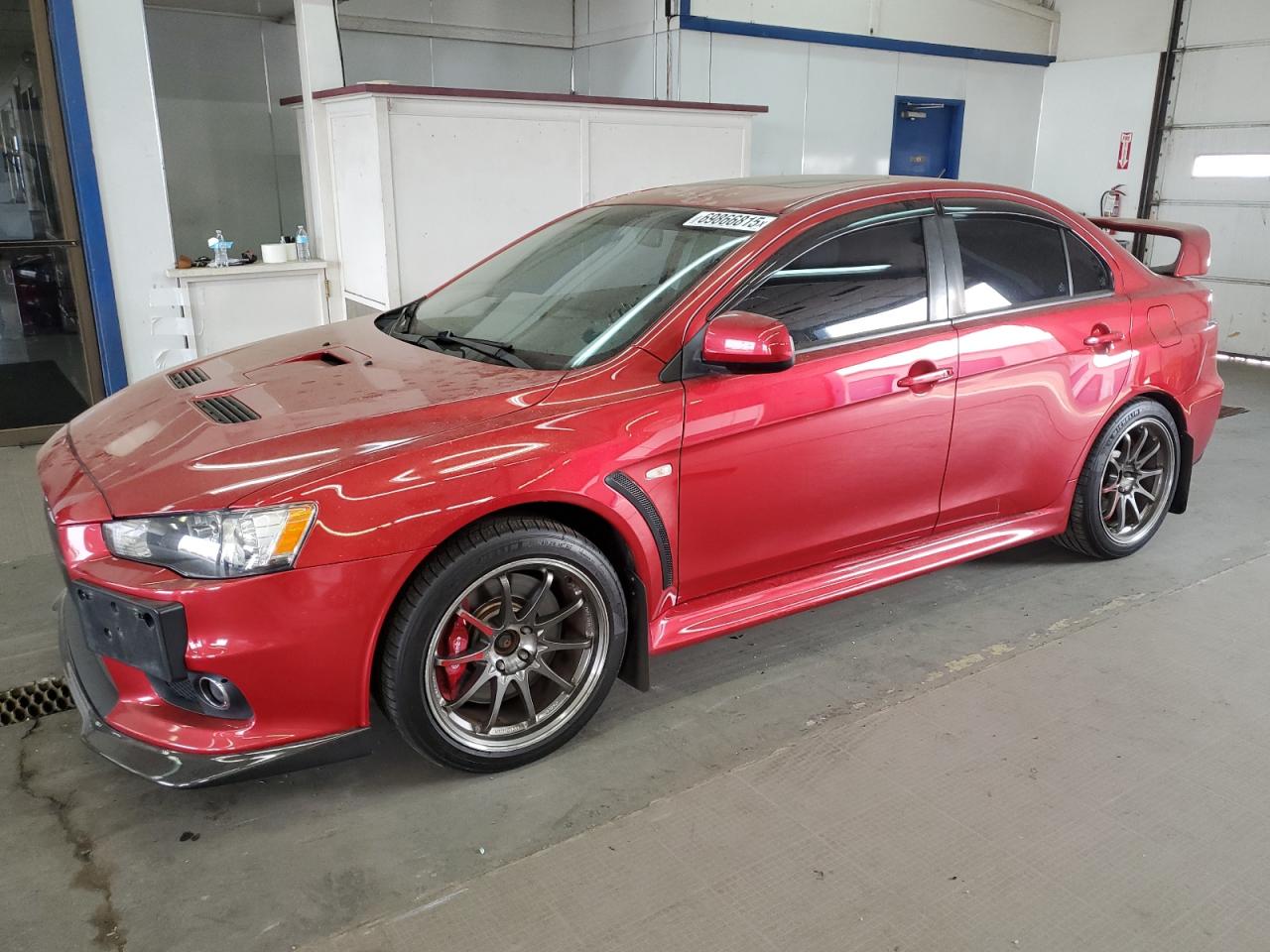 2012 Mitsubishi Lancer Evolution GSR, VIN JA32W8FV9CU032966 — Rear end