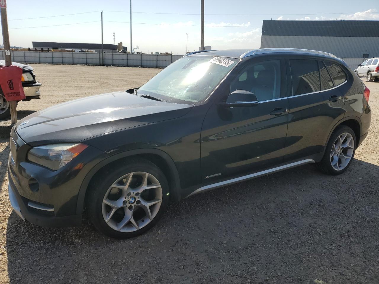 2014 BMW X1 xDrive28i, VIN WBAVL1C52EVR94300 — Rear end
