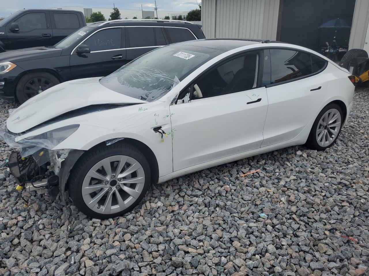 2021 Tesla Model 3 Standard Range Plus, VIN 5YJ3E1EA3MF856731 — Frame damage