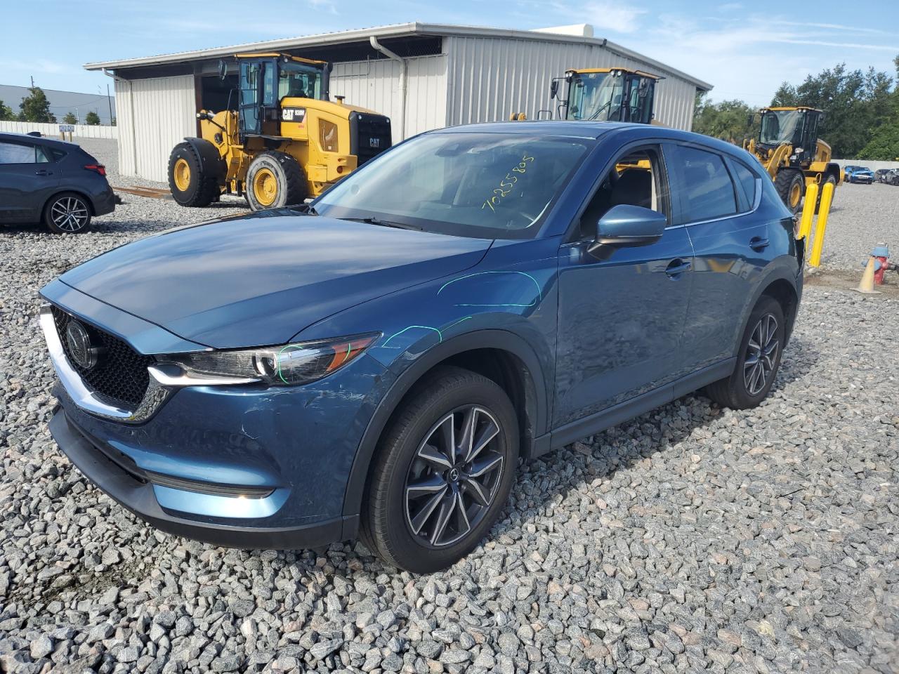 2018 Mazda CX-5 Touring, VIN JM3KFACM3J1448893 — Rear end