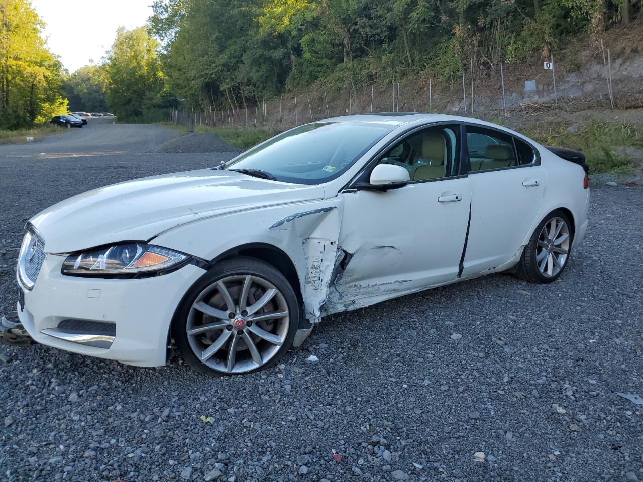 2015 Jaguar XF Portfolio, VIN SAJWJ0FF5F8U70653 — Side