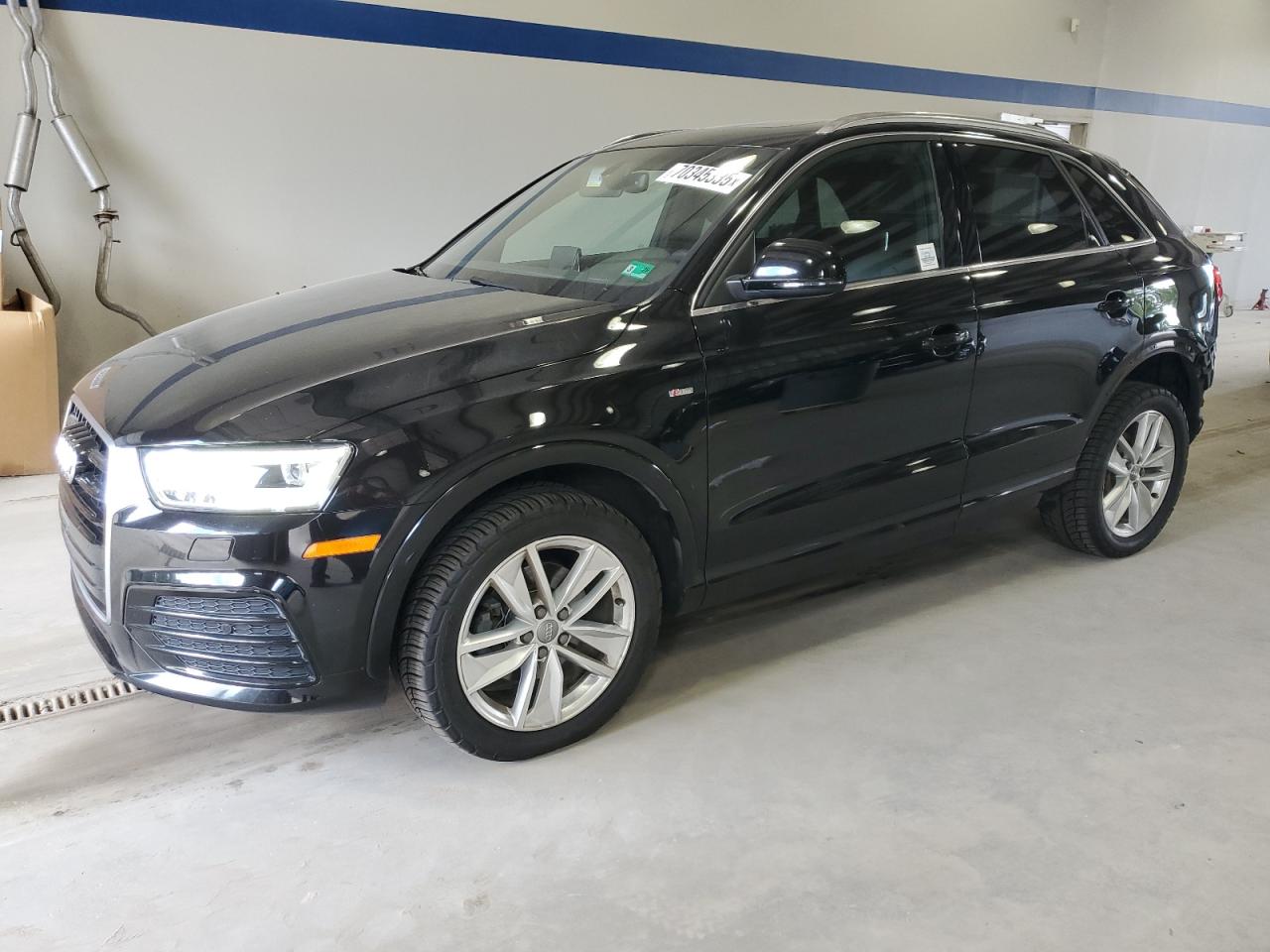 2018 Audi Q3 Premium Plus, VIN WA1JCCFSXJR026912 — Rear end