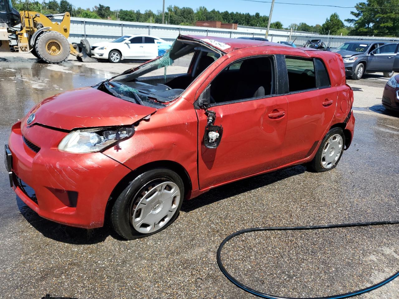 2012 Scion xD, VIN JTKKU4B43C1019248 — Rollover