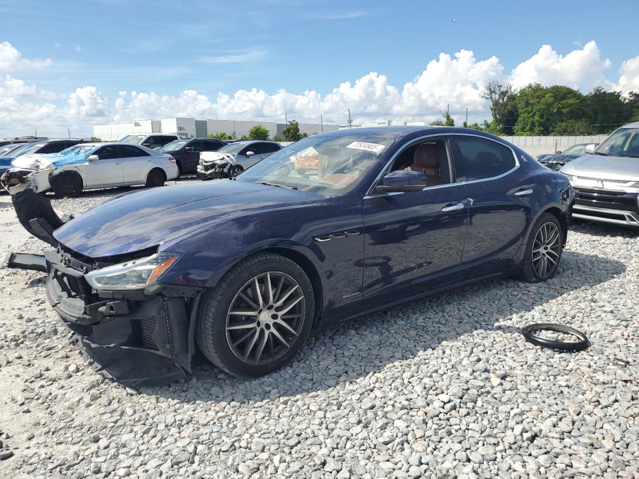 2019 Maserati Ghibli GranLusso, VIN ZAM57XSL9K1336529 — Side