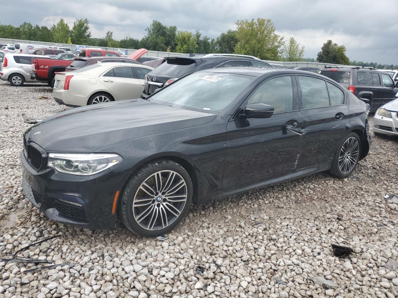 2018 BMW 5 Series 530i xDrive, VIN WBAJA7C58JWA74346 — Rear end