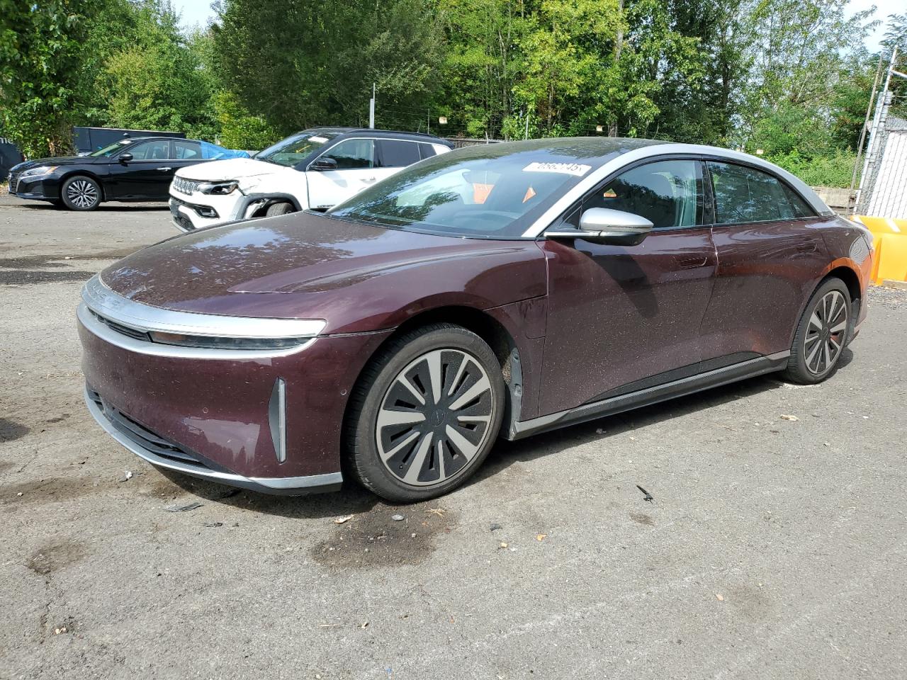 2022 Lucid Air Grand Touring, VIN 50EA1GBA5NA001707 — Бок