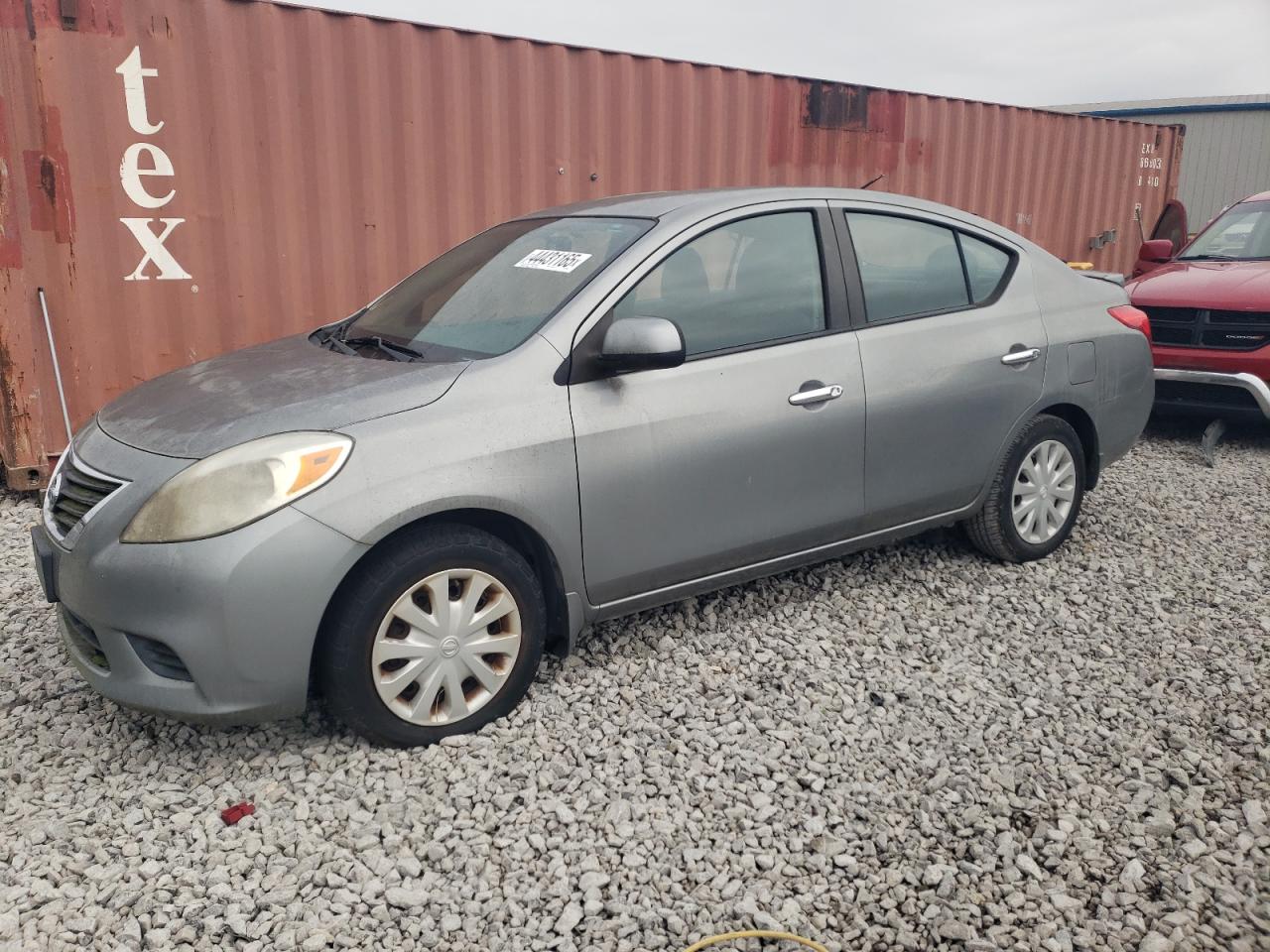 2013 Nissan Versa S, VIN 3N1CN7AP9DL858999 — Normal wear