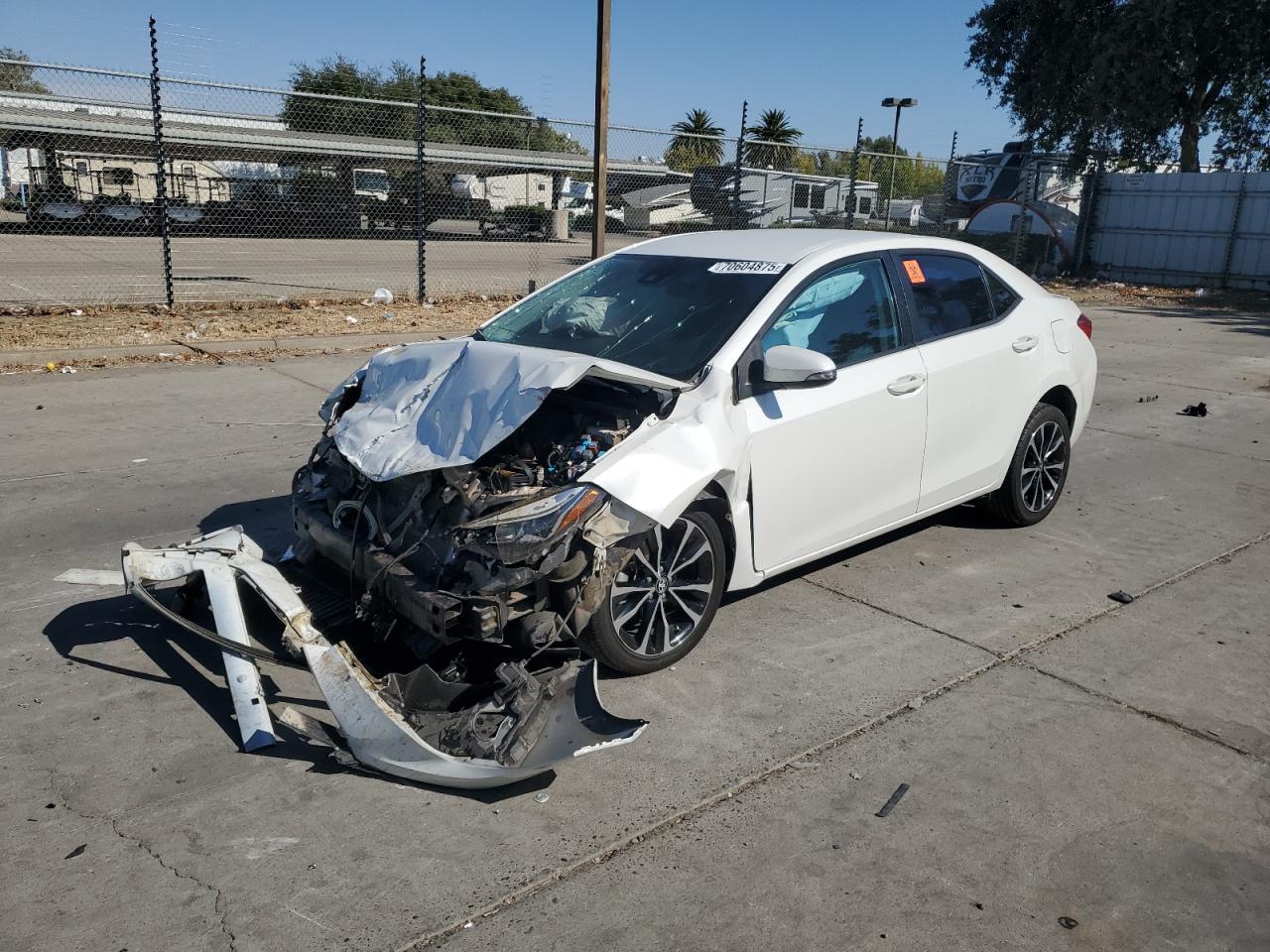 2018 Toyota Corolla L, VIN 5YFBURHE9JP796076 — Front end