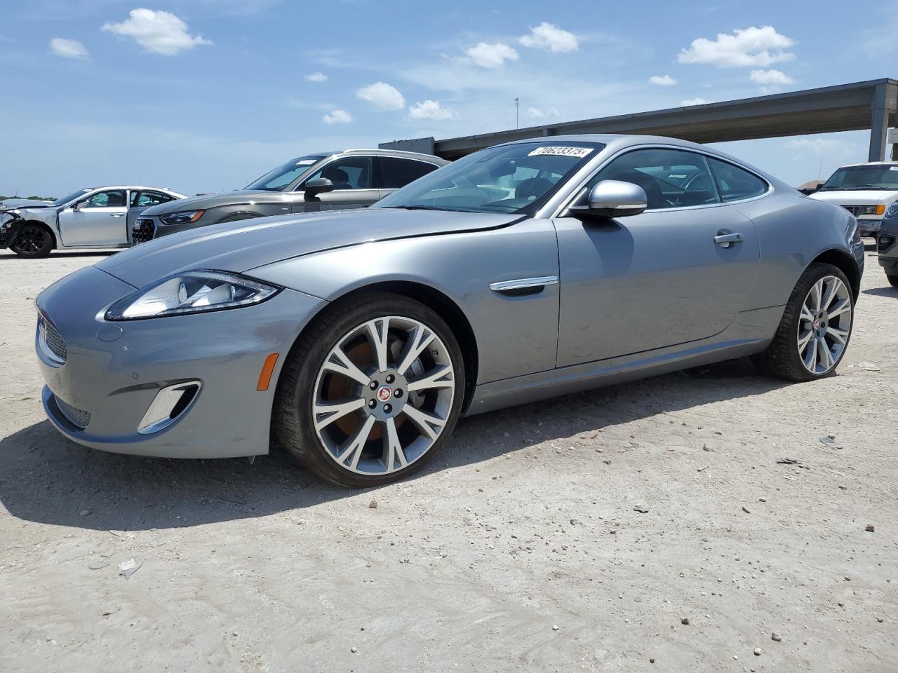 2014 Jaguar XK, VIN SAJWA4FB6ELB54004 — Minor dents and scratches