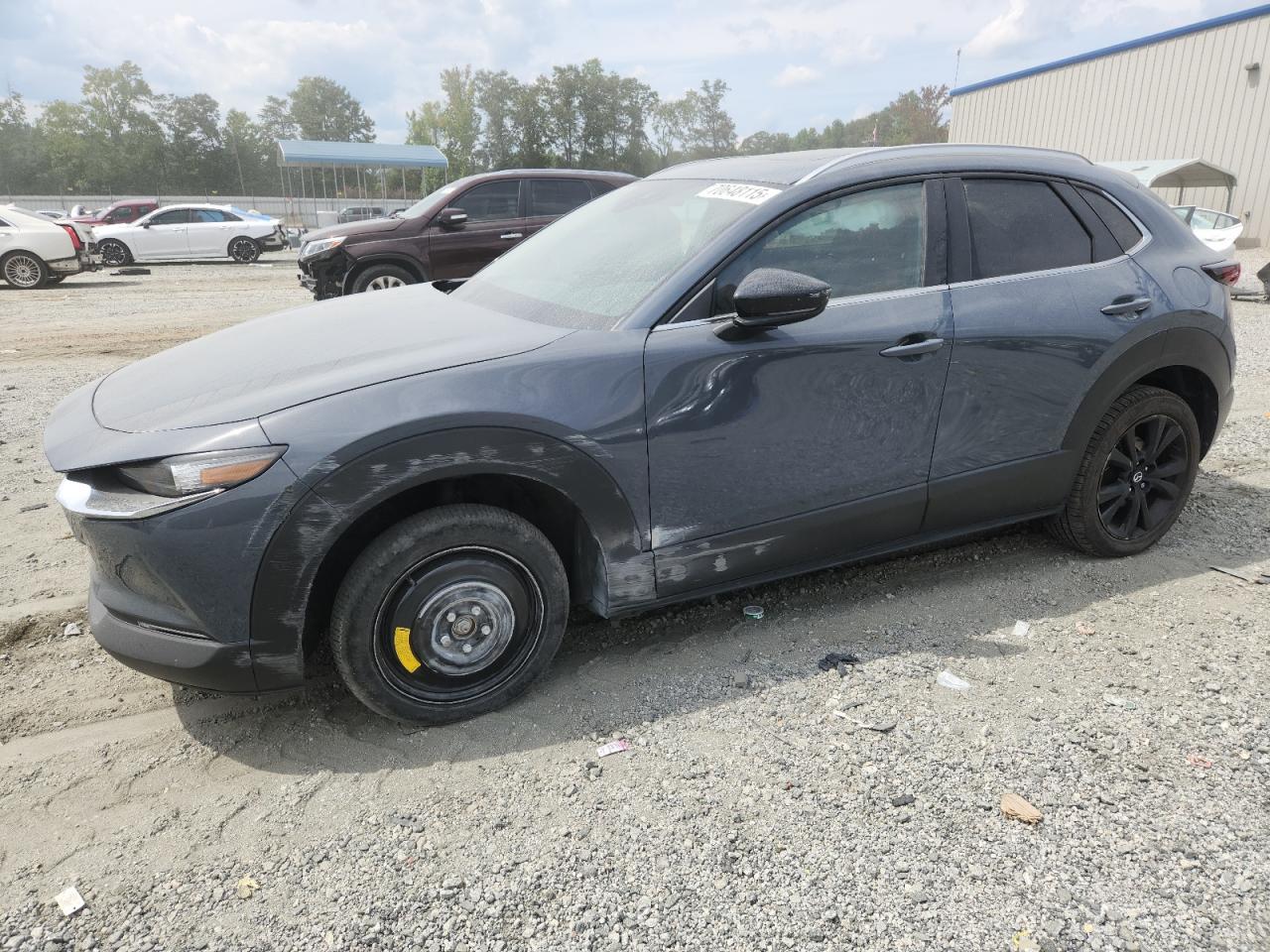 2023 Mazda CX-30 S Carbon Edition, VIN 3MVDMBCM6PM502954 — Front end