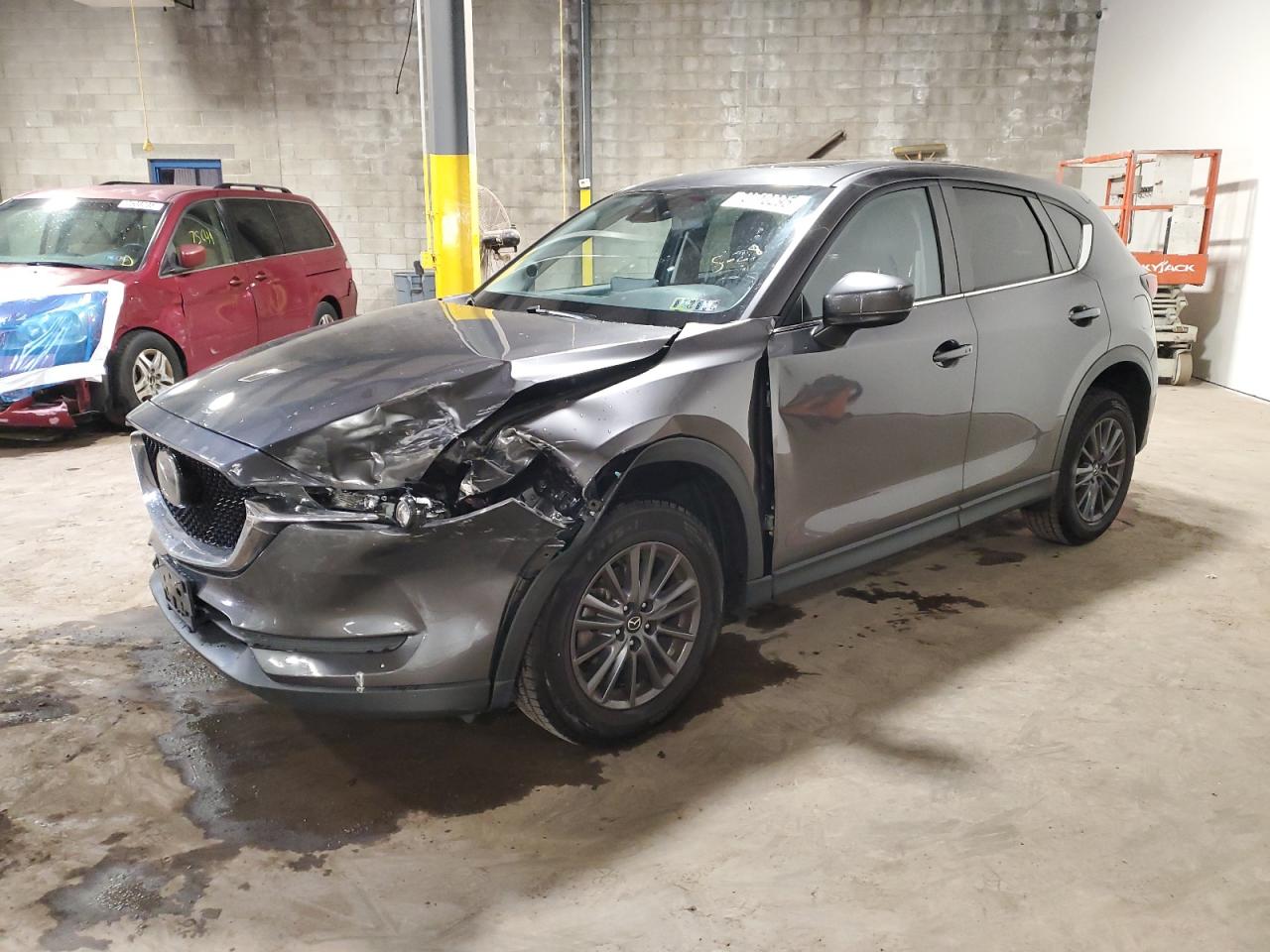 2021 Mazda CX-5 Touring, VIN JM3KFBCM5M1385502 — Side