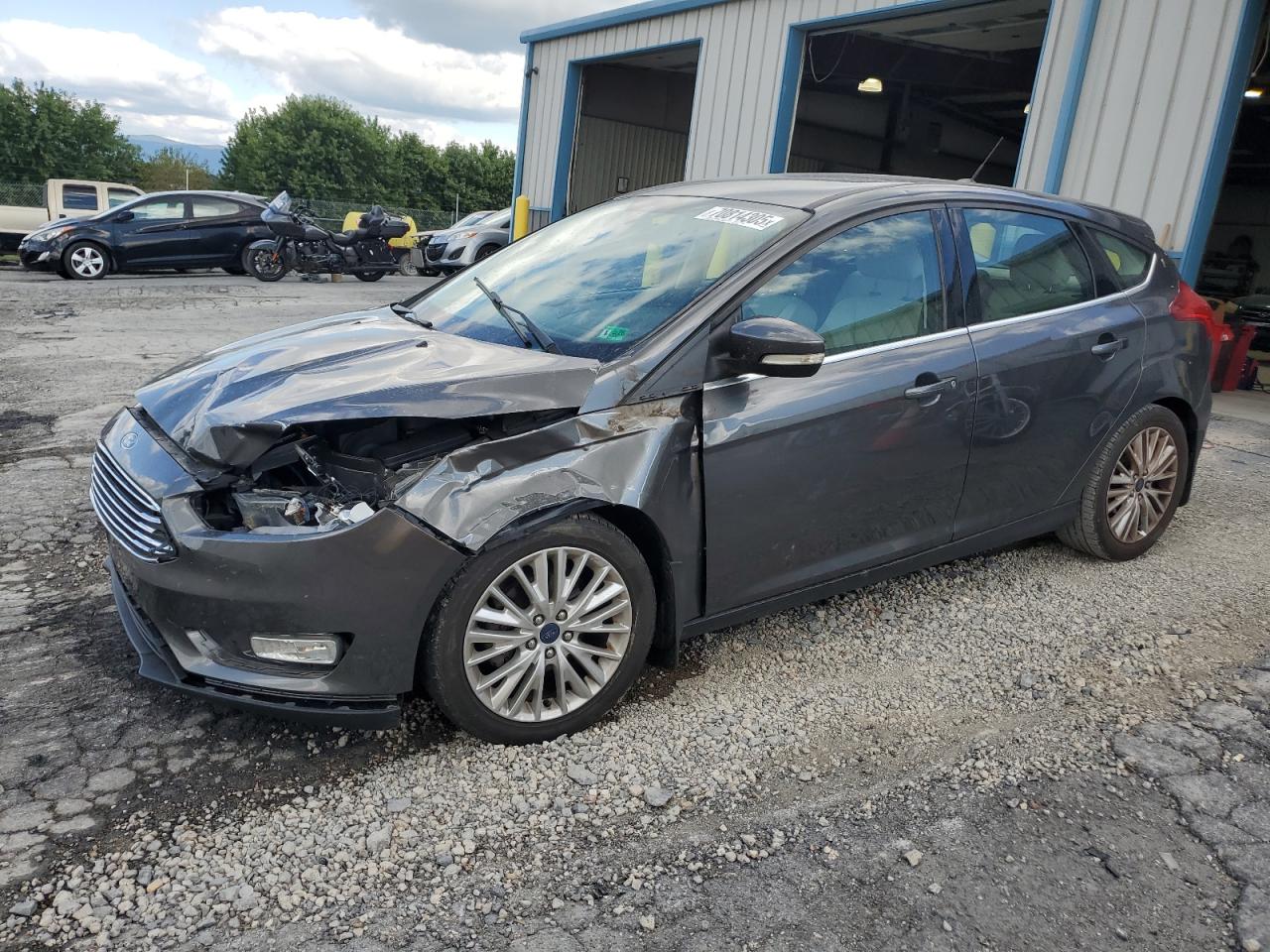2015 Ford Focus Titanium, VIN 1FADP3N27FL322236 — Front end