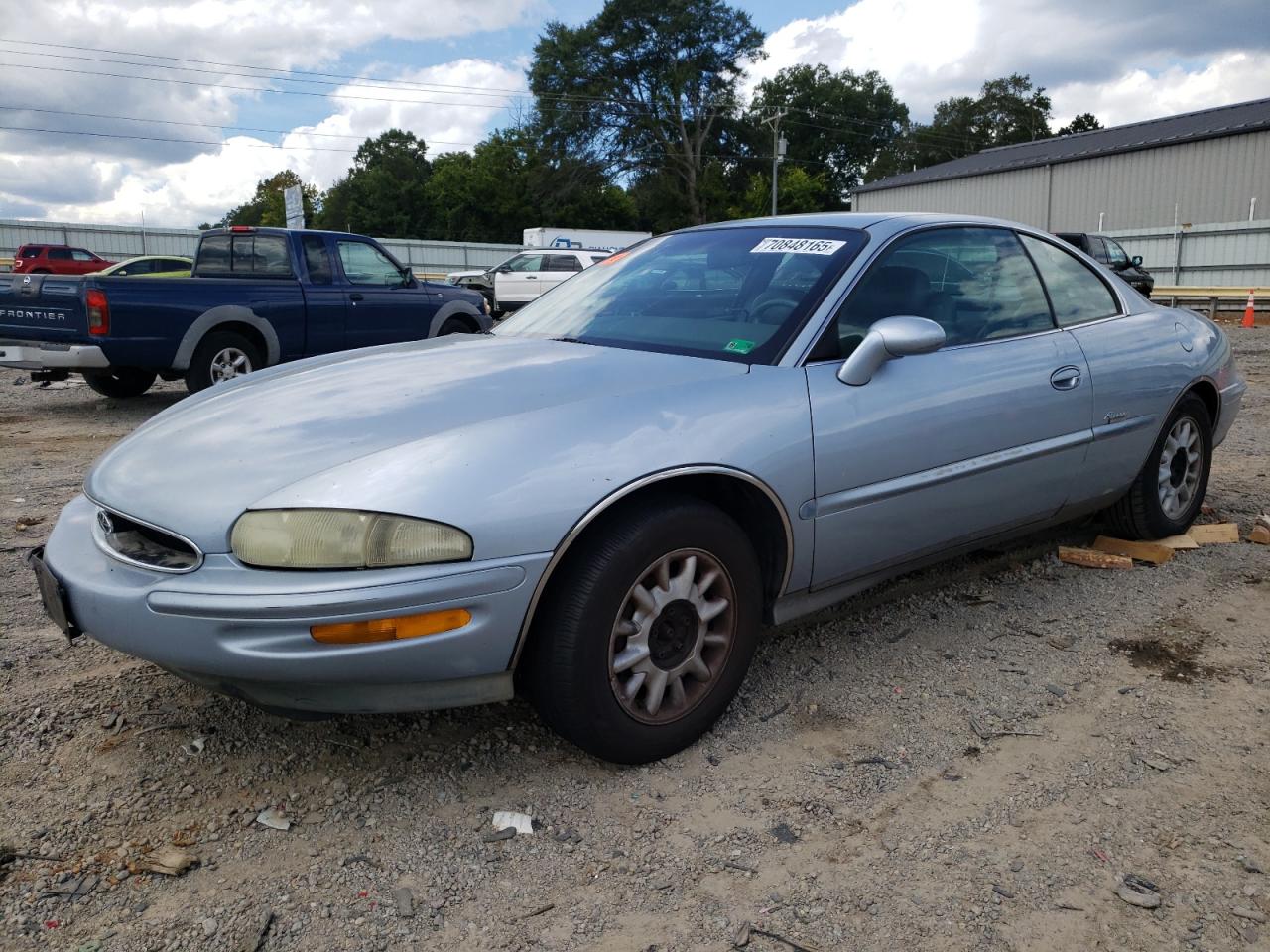 1995 Buick Riviera, VIN 1G4GD2211S4705773 — Фото с аукциона 1 of 13