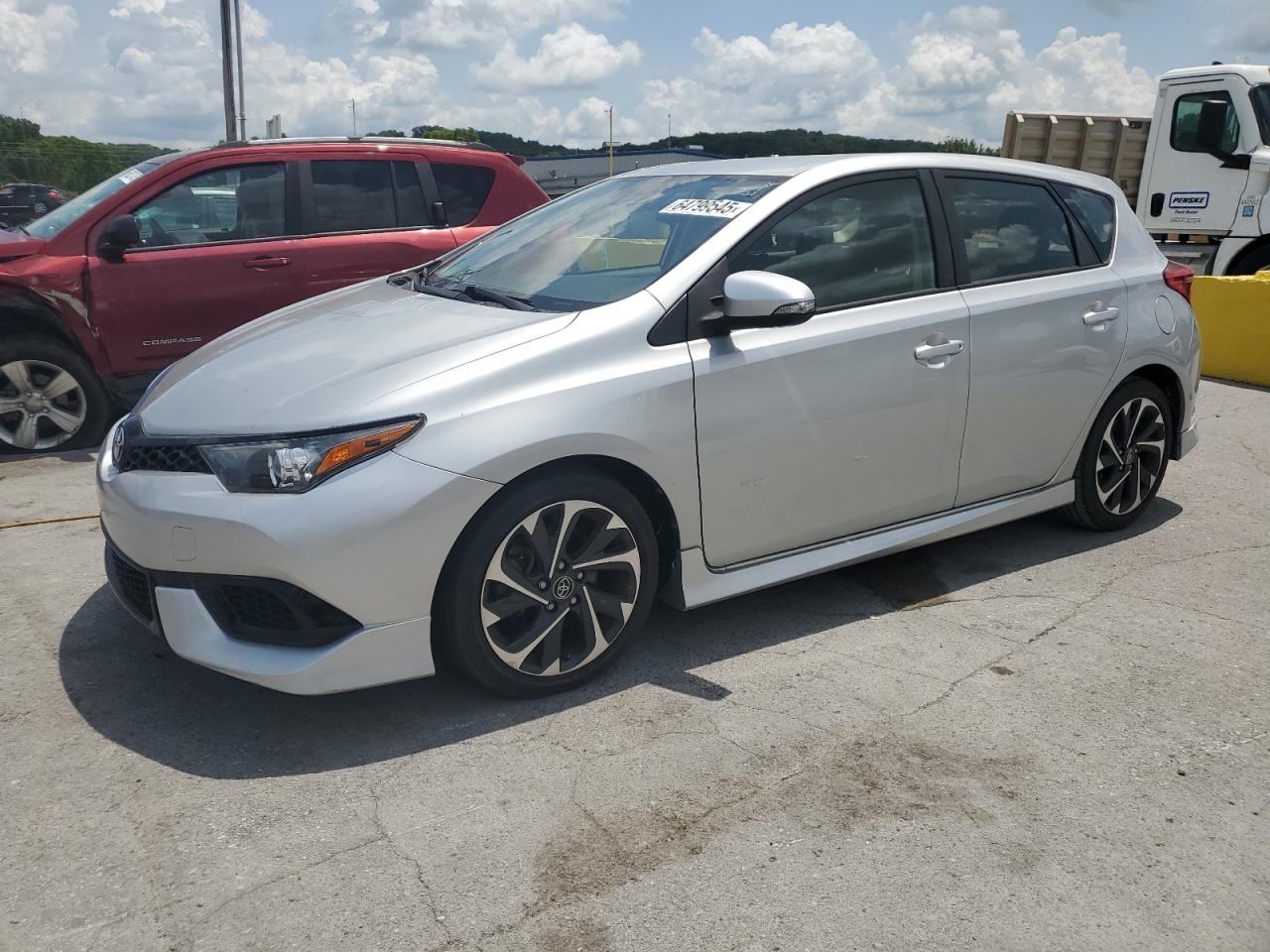 2018 Toyota Corolla, VIN JTNKARJE2JJ553325 — Water / flood