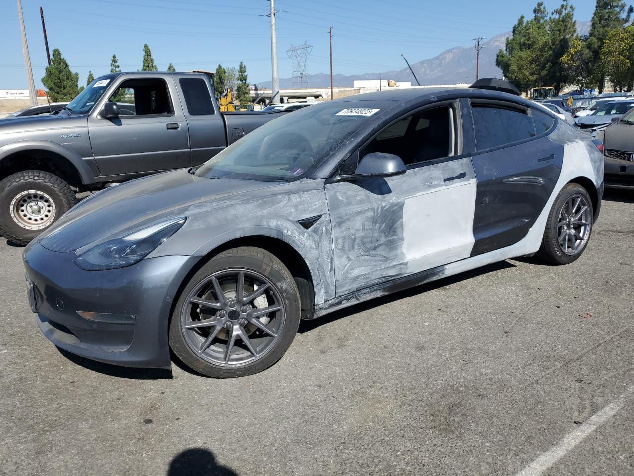 2021 Tesla Model 3 Long Range, VIN 5YJ3E1EBXMF045257 — Partial repair
