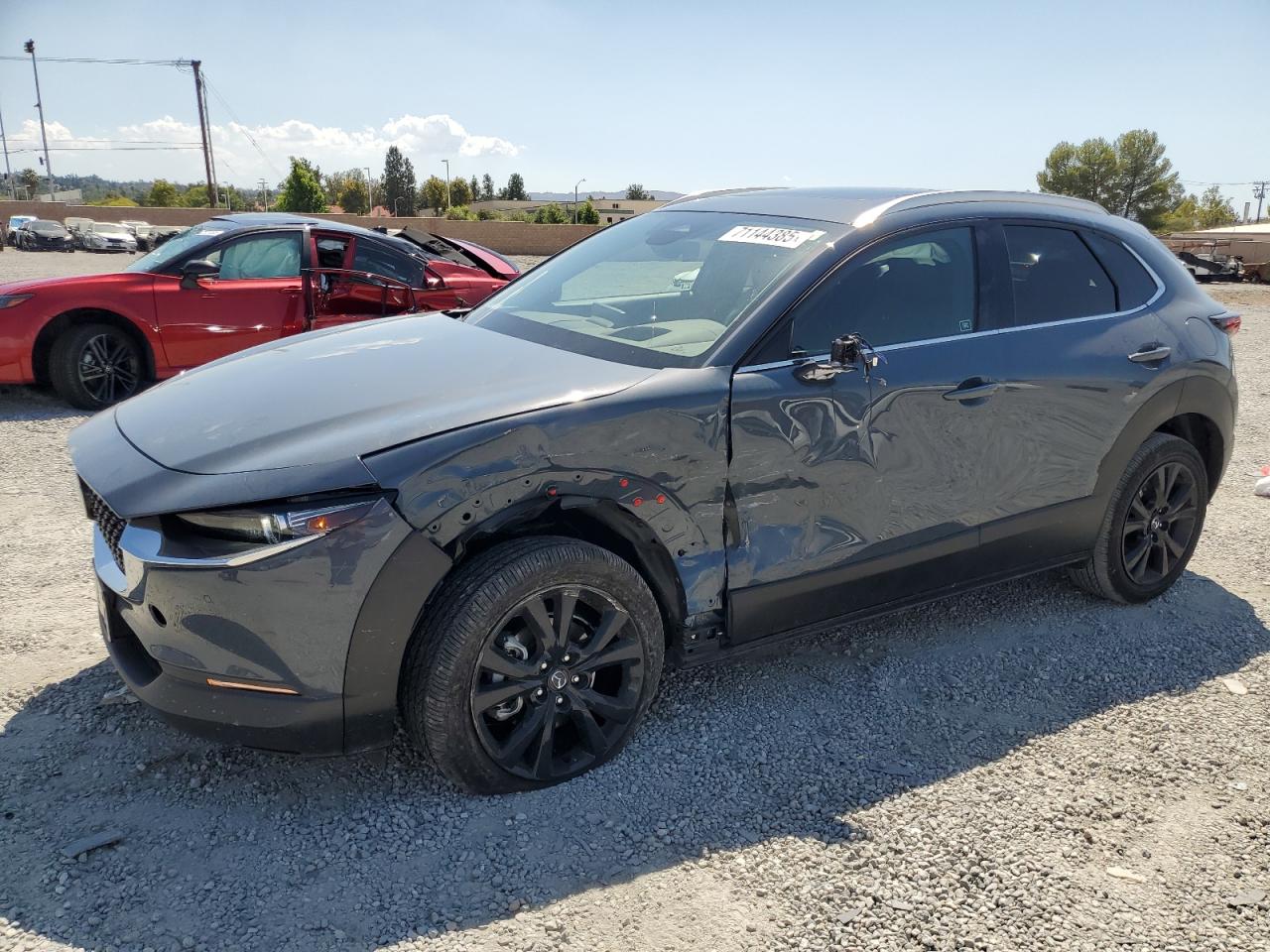 2024 Mazda CX-30 Premium Plus, VIN 3MVDMBEY7RM671478 — Front end