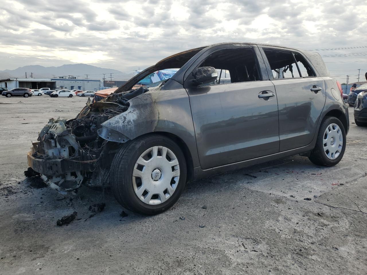 2014 Scion xD, VIN JTKKUPB41E1040992 — Burn