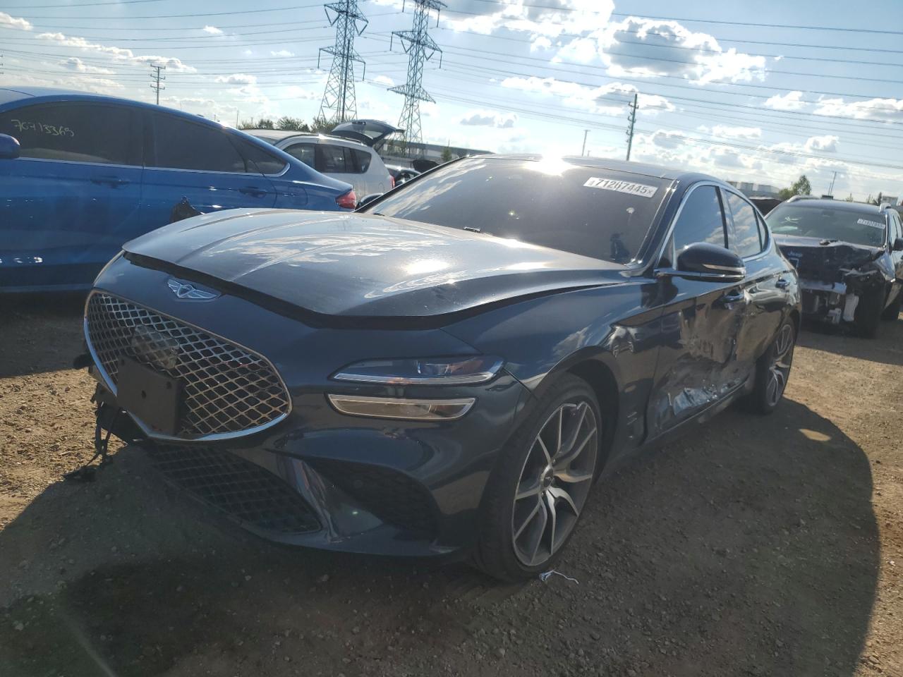 2022 Genesis G70 2.0T, VIN KMTG34TA1NU102409 — Side