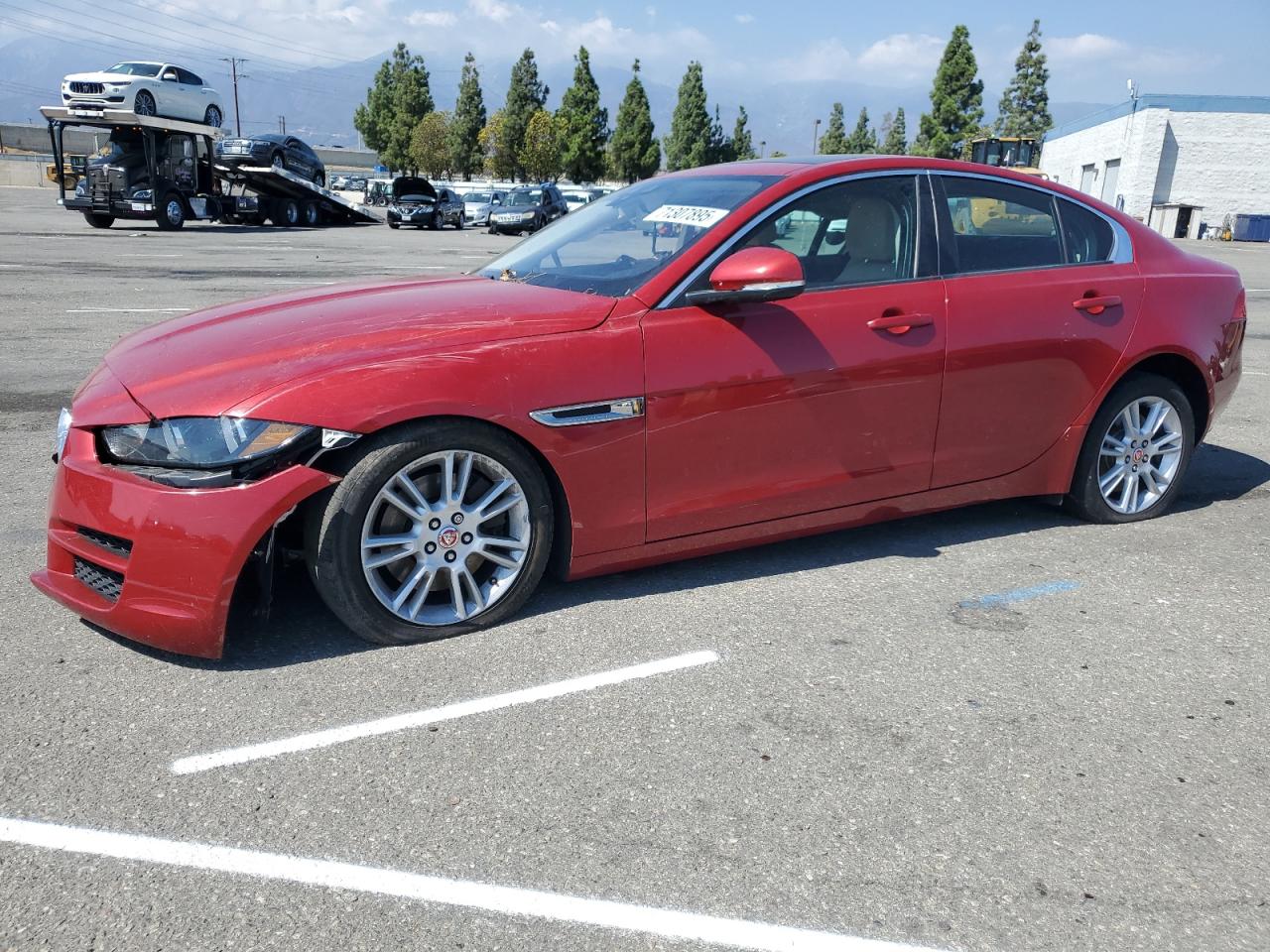2018 Jaguar XE 25t Premium, VIN SAJAD4FX0JCP26544 — Side