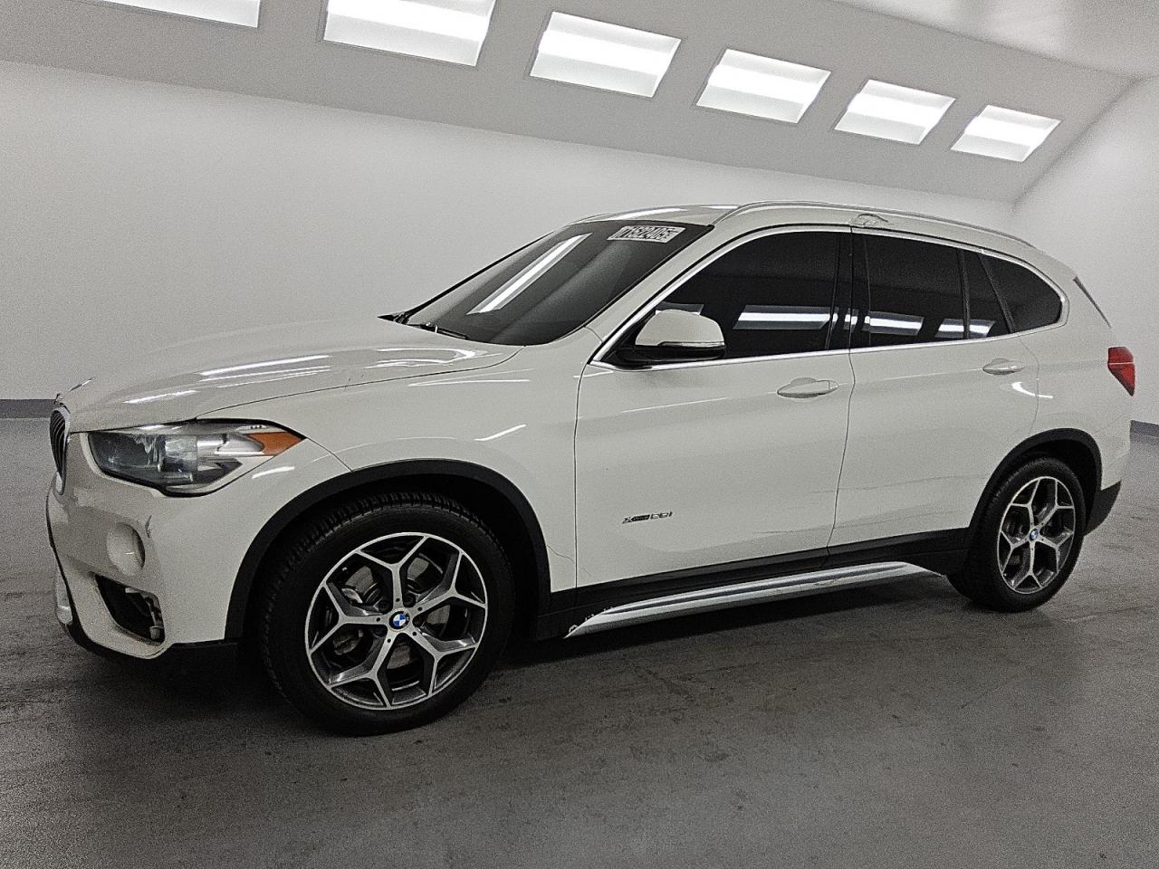 2018 BMW X1 xDrive28i, VIN WBXHT3C31J5F89149 — Auction photo