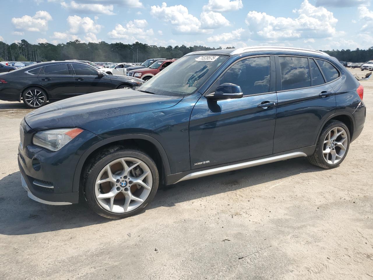2015 BMW X1 xDrive35i, VIN WBAVM5C57FVV95064 — Vandalism