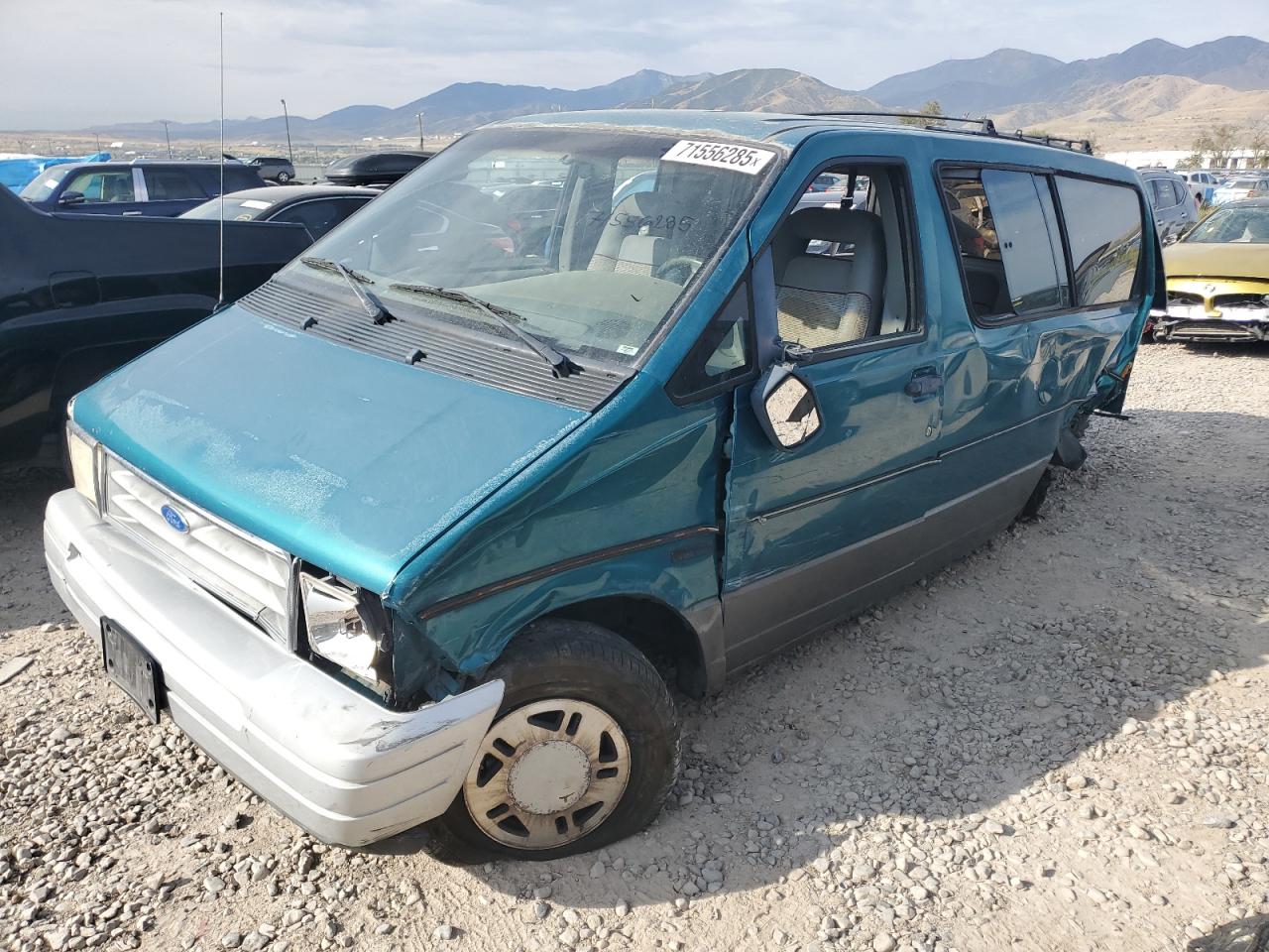 1994 Ford Aerostar Eddie Bauer, VIN 1FMDA41X0RZA93964 — Side