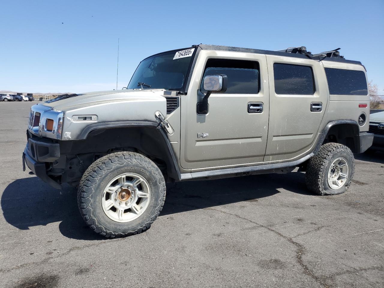 2004 Hummer H2, VIN 5GRGN23UX4H121215 — Vandalism