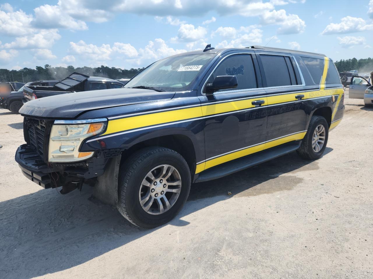 2018 Chevrolet Suburban Commercial, VIN 1GNSCKKC8JR150753 — Side