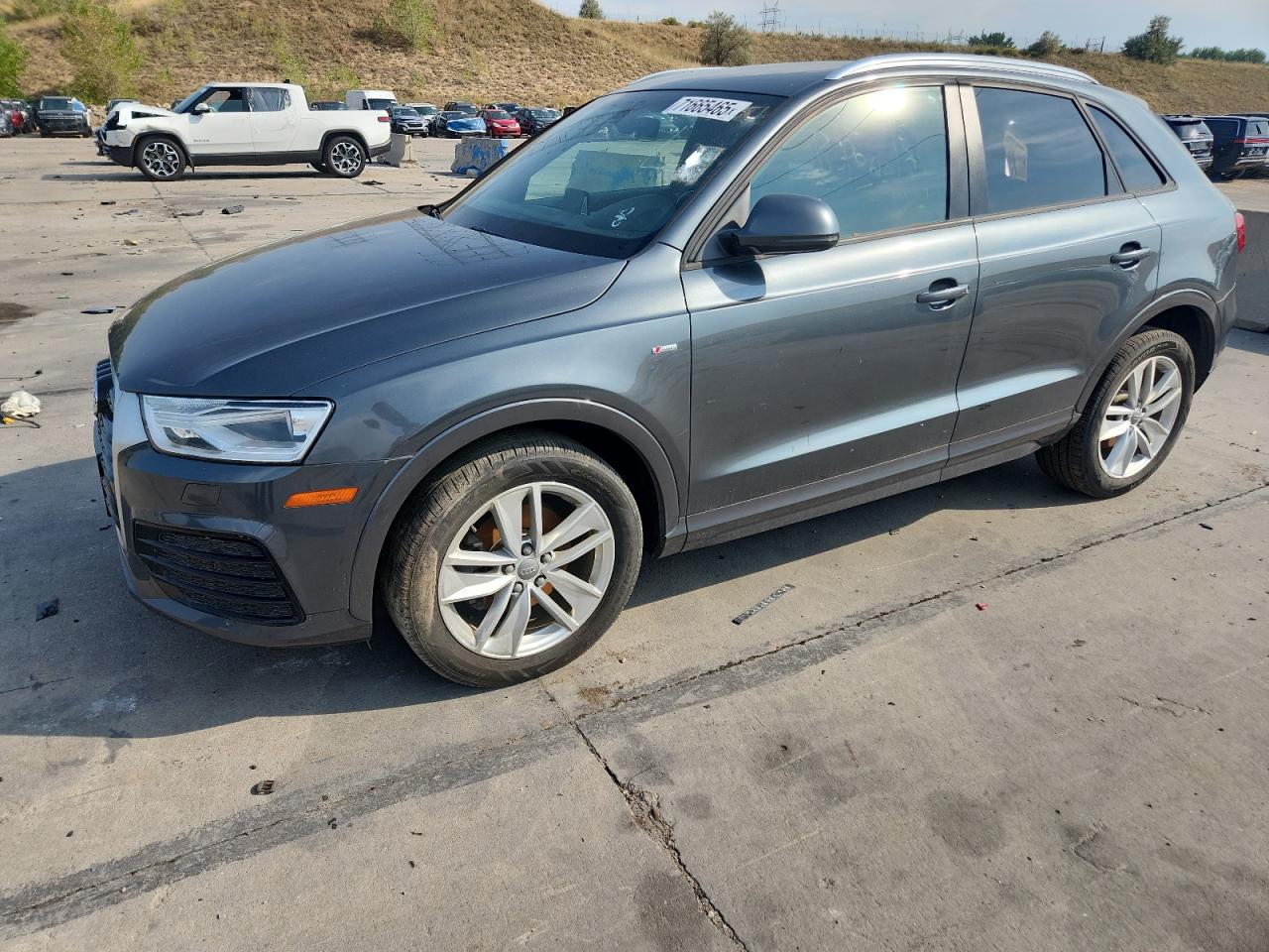 2018 Audi Q3 Premium, VIN WA1ECCFS1JR011555 — Фото с аукциона