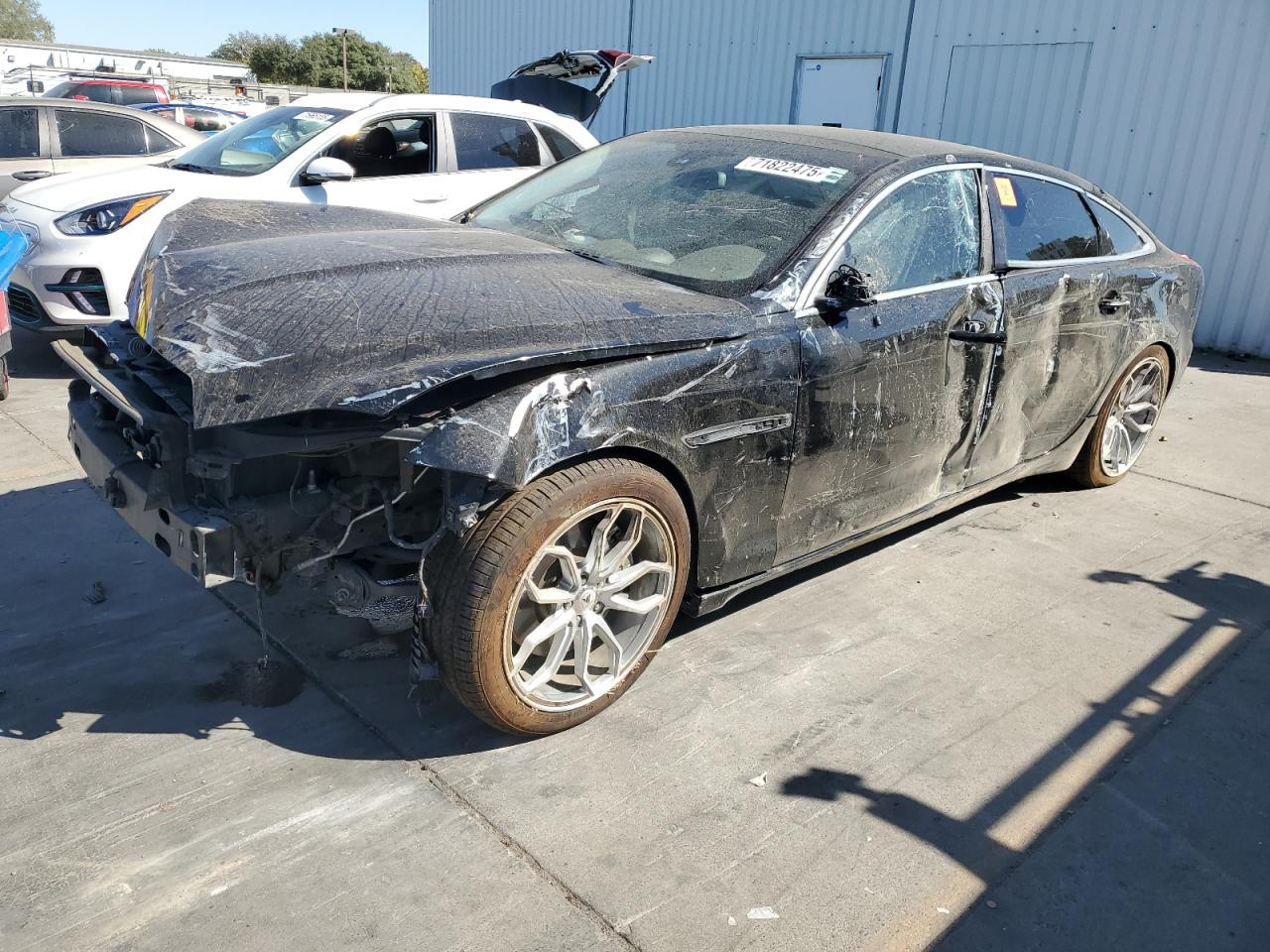 2013 Jaguar XJ Portfolio, VIN SAJWA2GB1DLV45978 — Side
